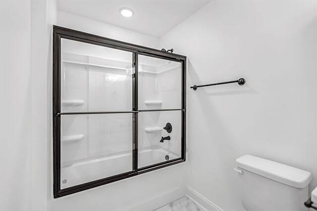 Amber Vista modern bathroom with glass shower and premium fixtures