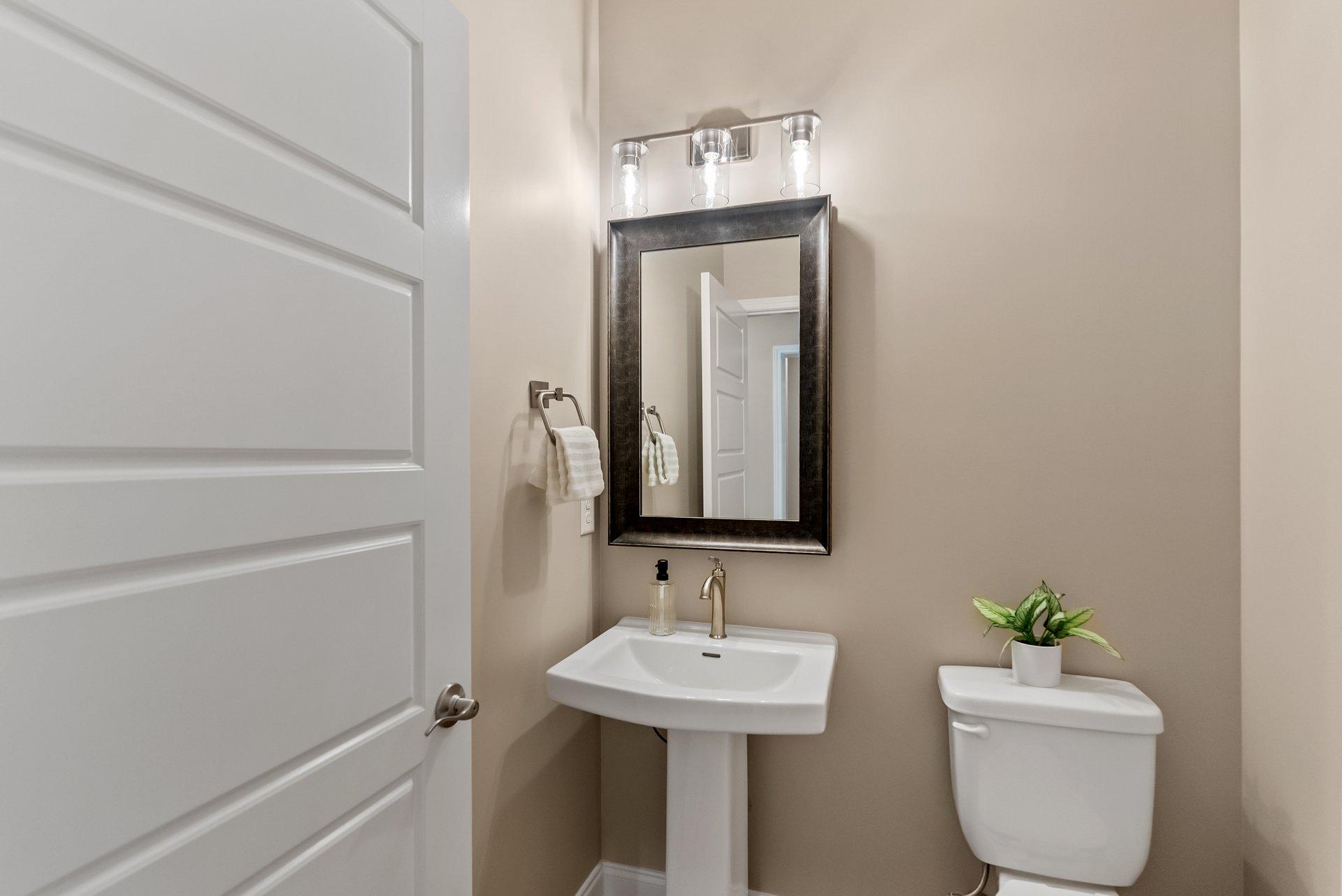 Green Meadows modern bathroom with glass shower and premium fixtures