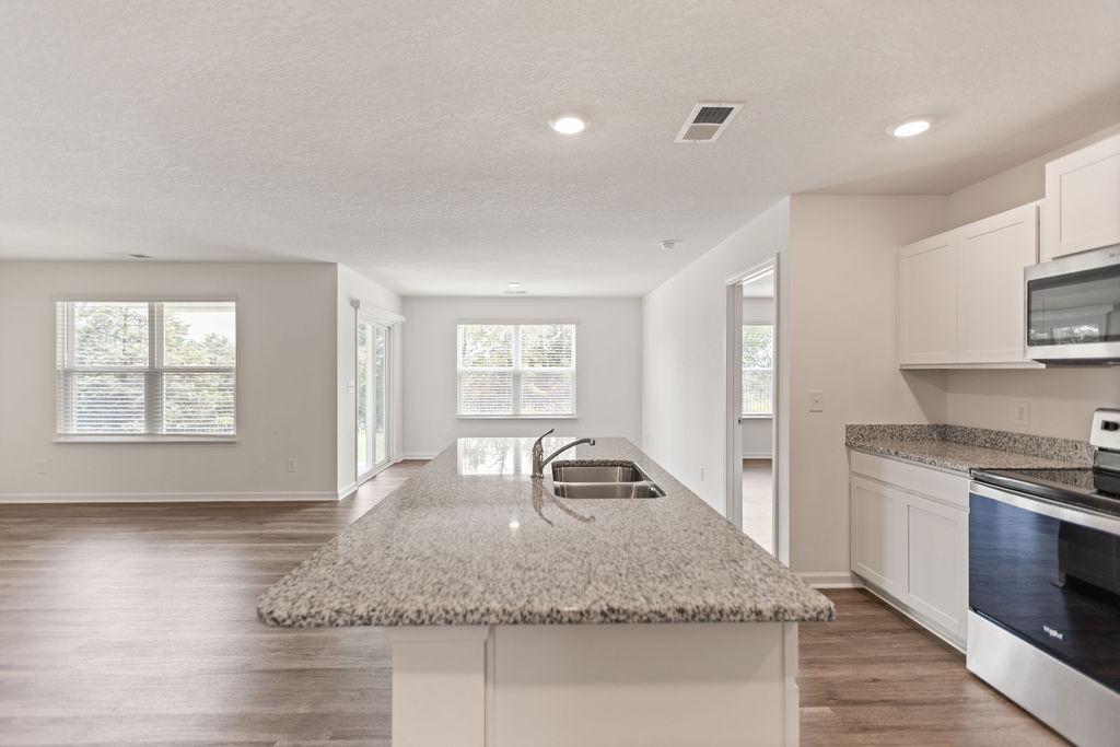 Mockingbird Meadows community exterior showing landscaping and architectural details in Halls