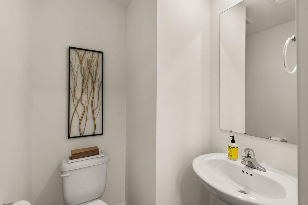 Mockingbird Meadows modern bathroom with glass shower and premium fixtures