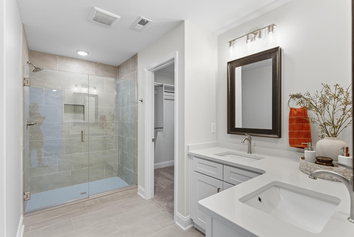 Poplar Creek modern bathroom with glass shower and premium fixtures