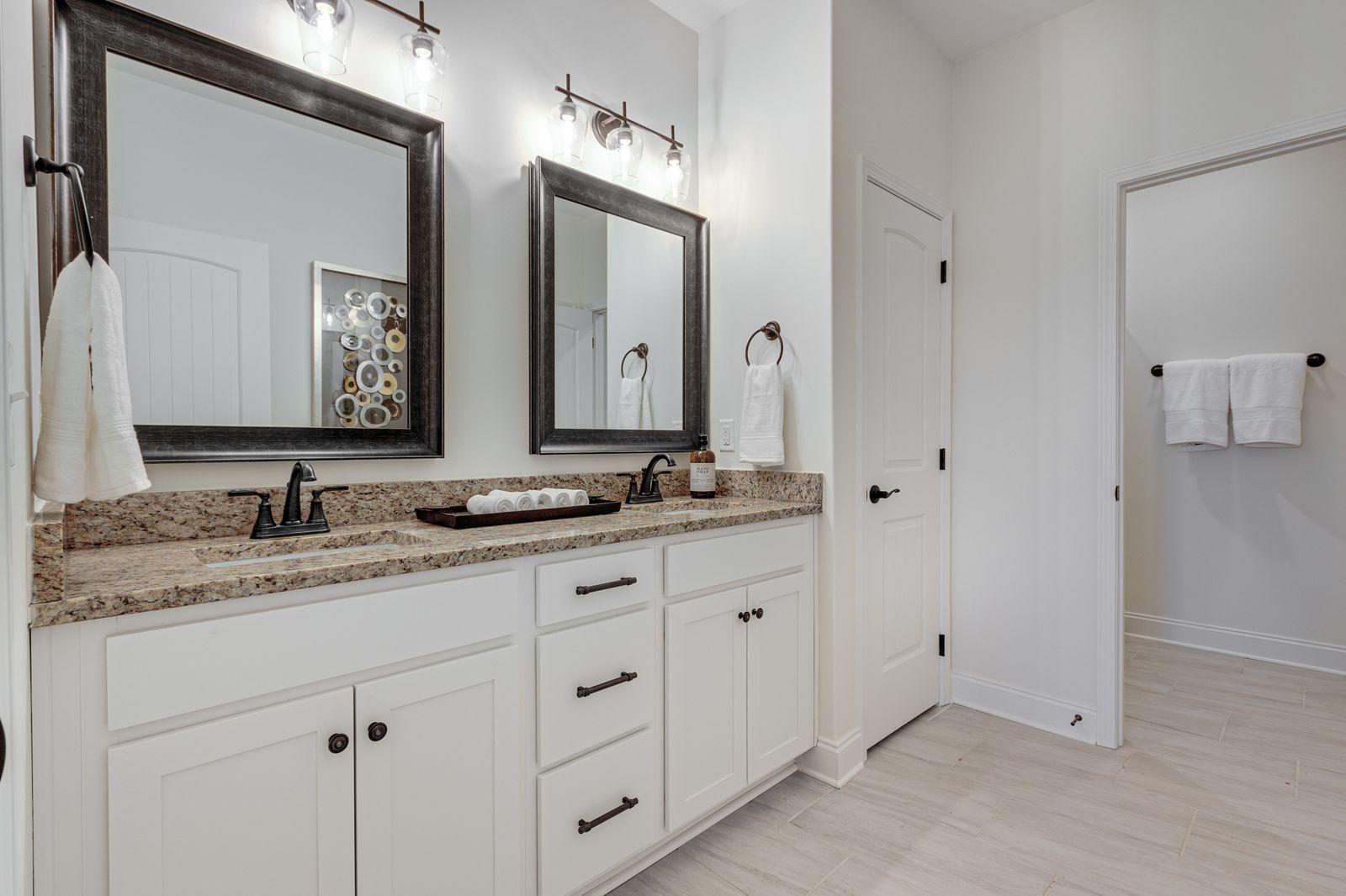Preston Park modern bathroom with glass shower and premium fixtures