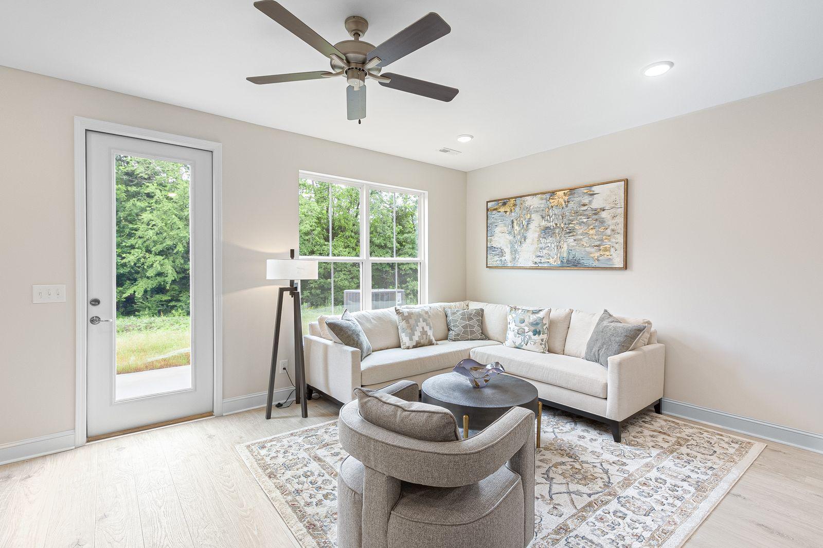 Snowmass open concept living space with balcony access