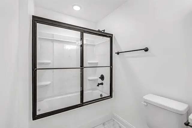 Amber Vista modern bathroom with glass shower and premium fixtures
