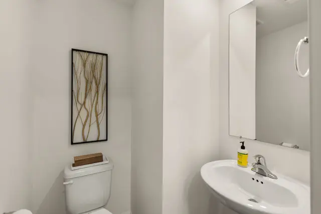 Mockingbird Meadows modern bathroom with glass shower and premium fixtures