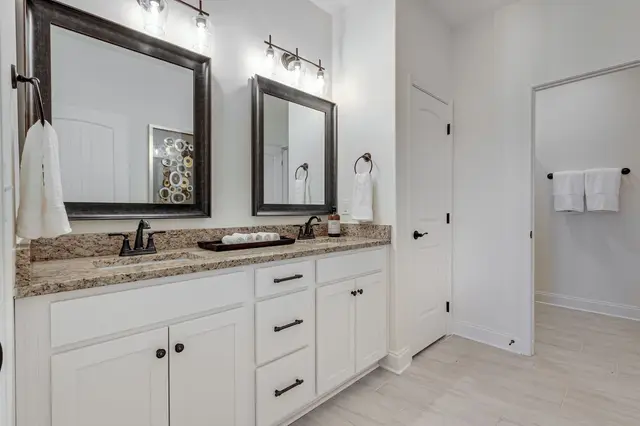Preston Park modern bathroom with glass shower and premium fixtures